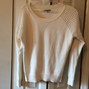 Cream long sleeve sweater.